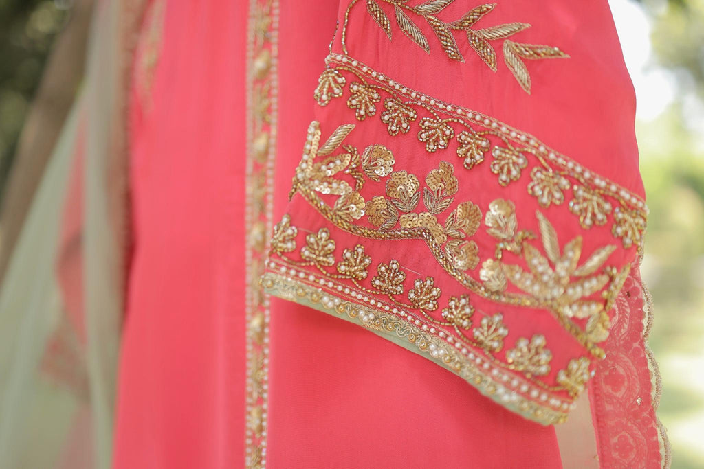 Coral Pink Festive Suit with Intricate Hand Embroidery