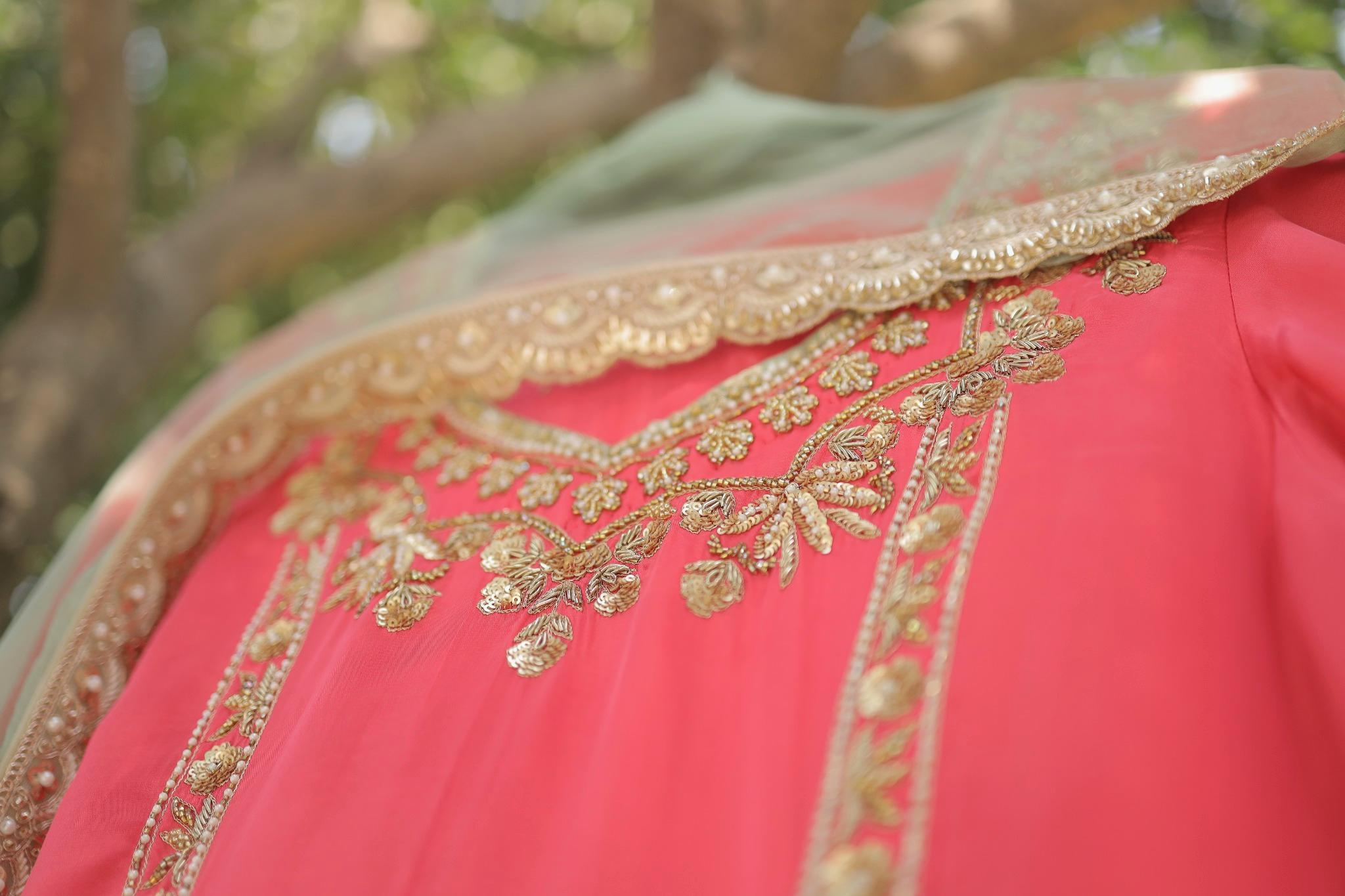 Coral Pink Festive Suit with Intricate Hand Embroidery
